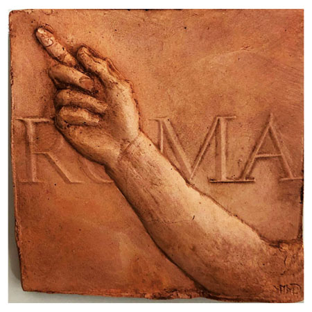 イタリアのメダル(十一月) 右腕と背景に「ROMA」の文字が彫られた作品。作者不詳。